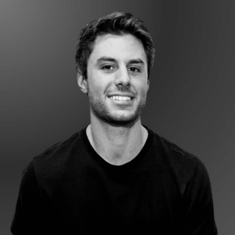 Black and white portrait of Andrew Orlando